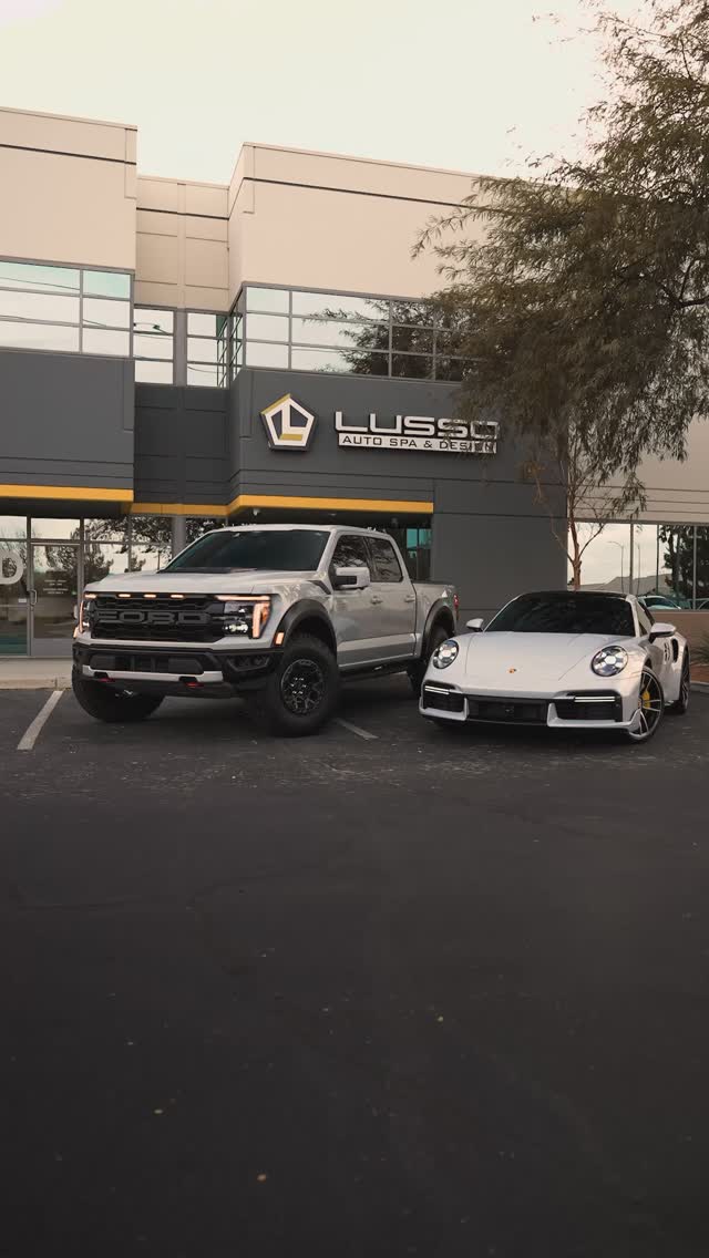 Ford Raptor R and Porsche 911 Turbo S with tinted glass outside Lusso Auto Design