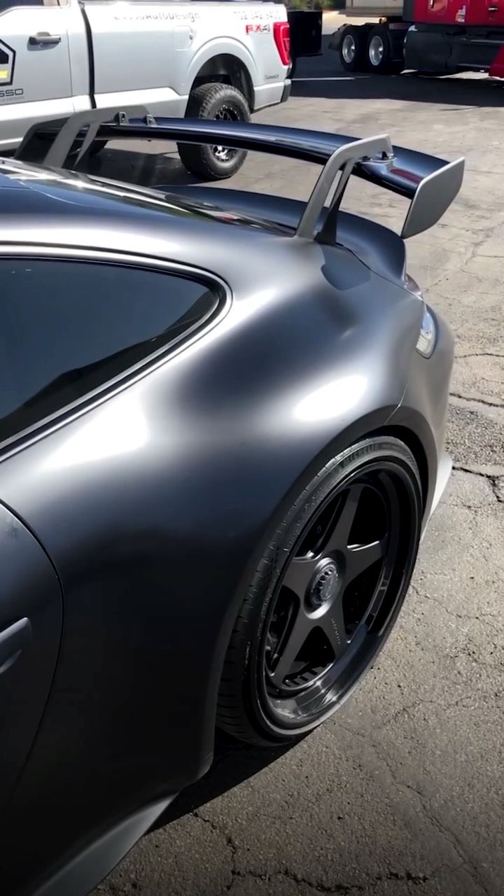 Satin grey Porsche 911 rear quarter after ceramic coating