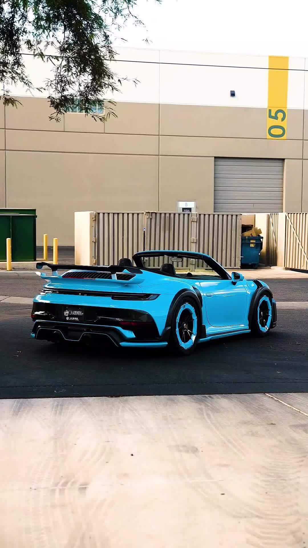 Blue widebody Porsche 911 Cabriolet with carbon aero built at Lusso Auto Design