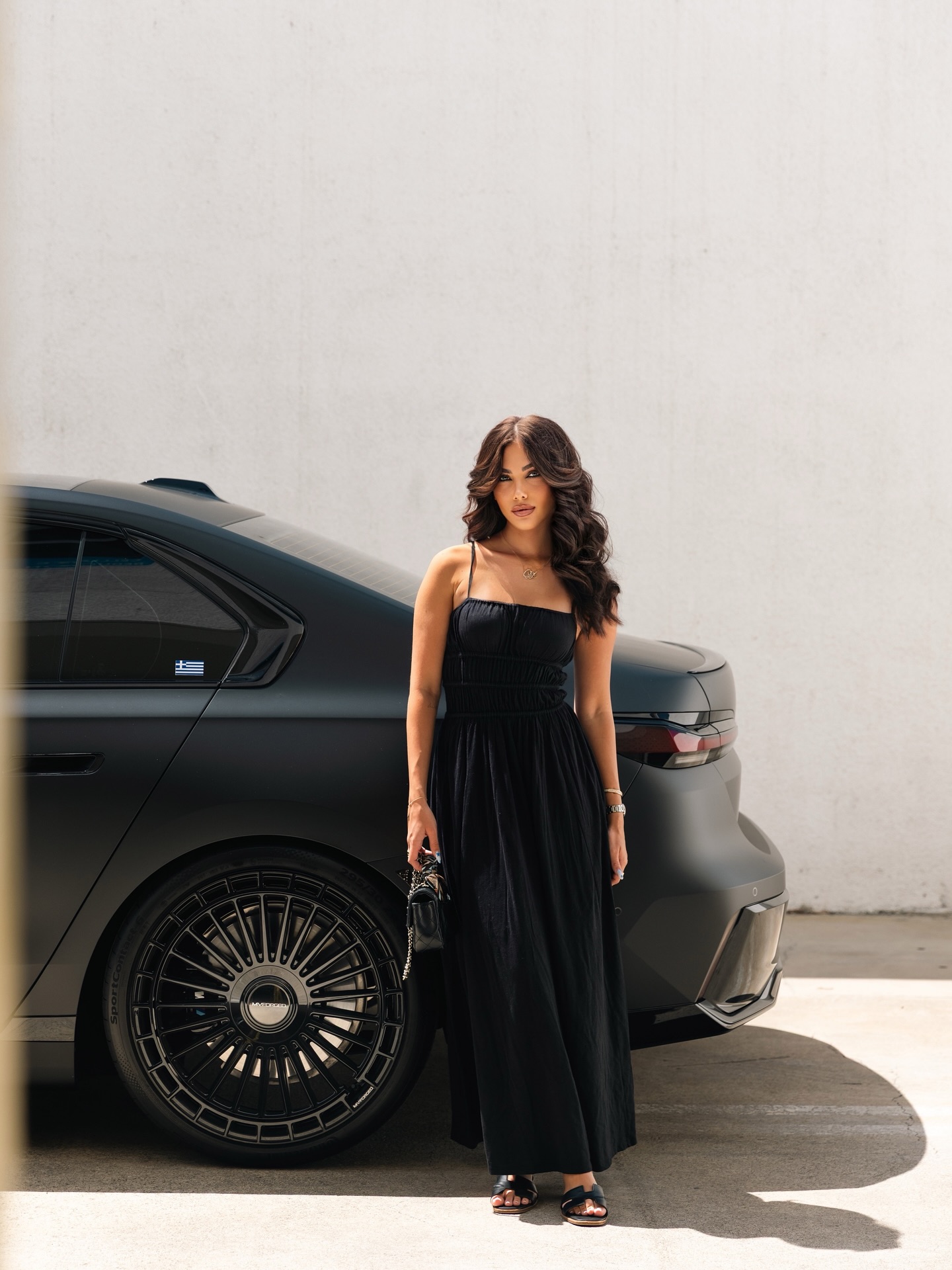 Matte black BMW 7 Series on gloss black MV Forged multi spoke wheels