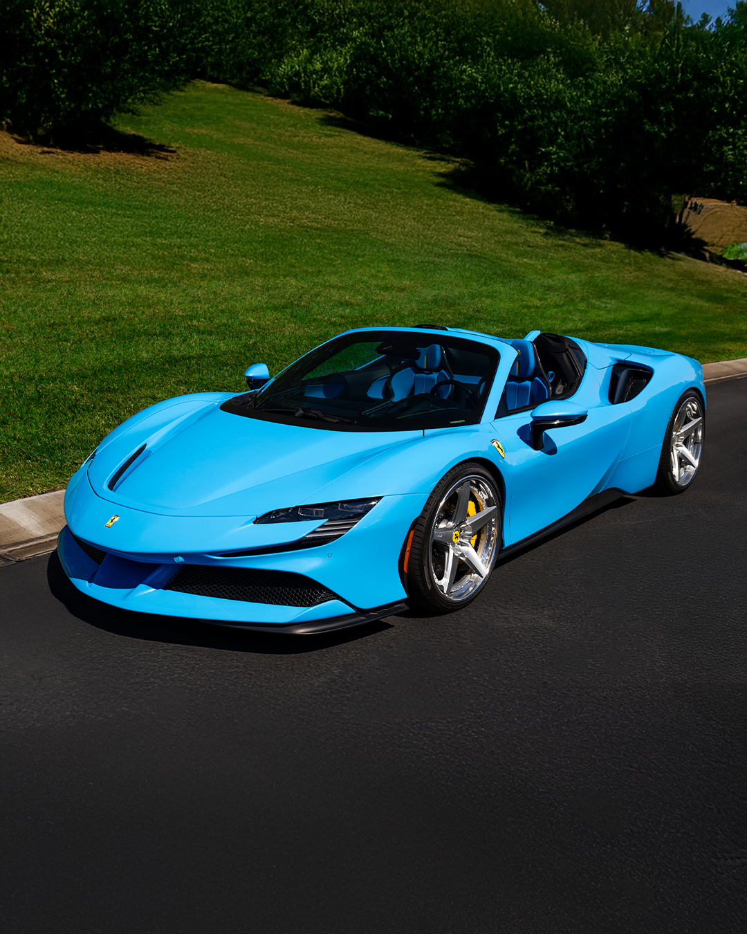 Baby blue Ferrari SF90 Spider on polished forged wheels