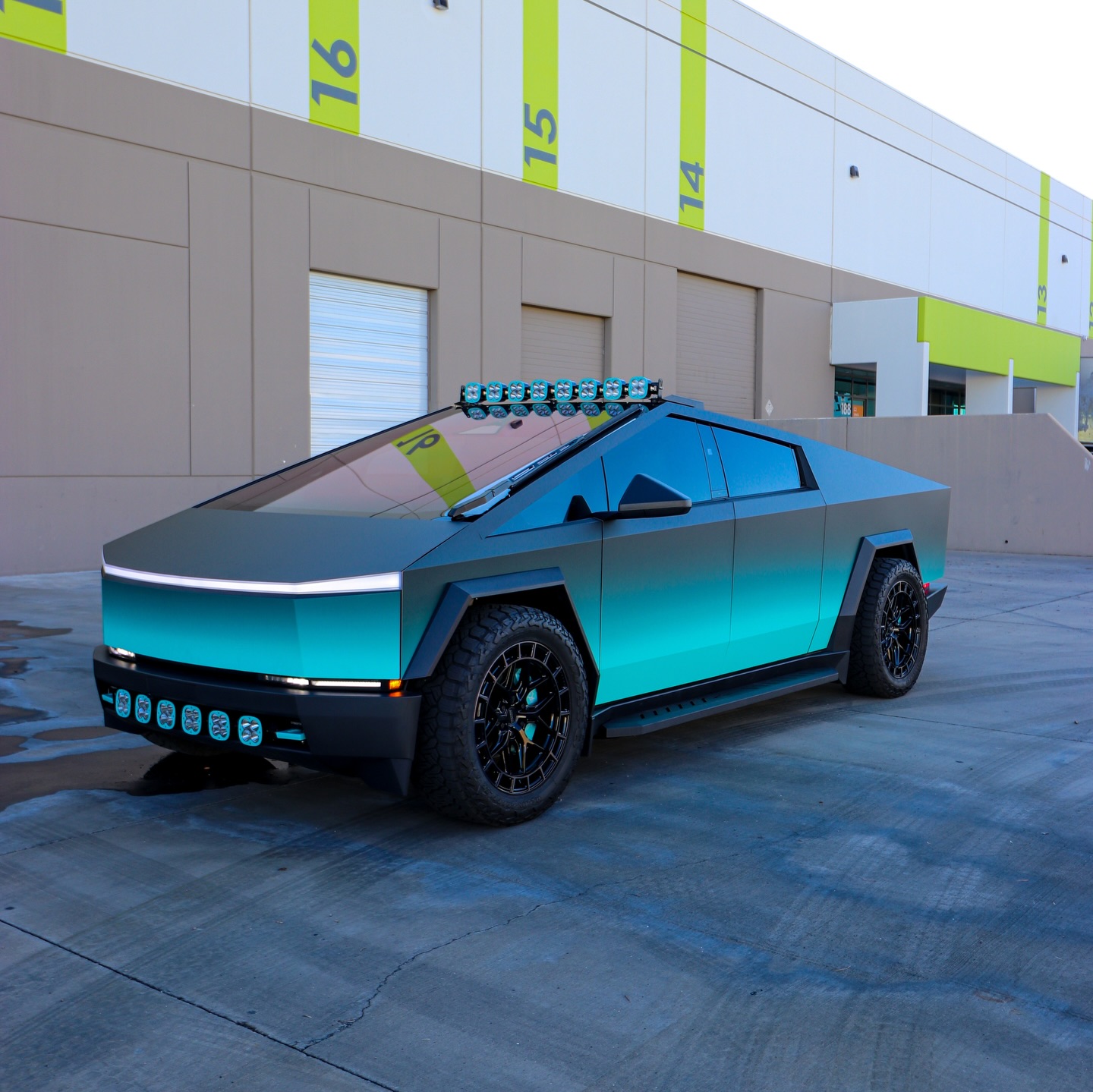 Tesla Cybertruck in a teal to grey fade wrap