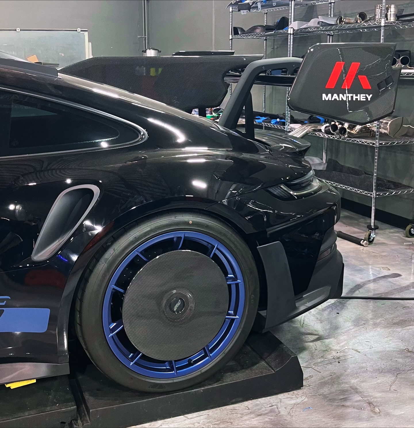 Manthey aero package on a Porsche 911 GT3 RS in the Lusso build bay
