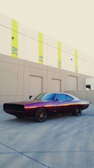 Classic Dodge Charger on custom suspension and bronze wheels