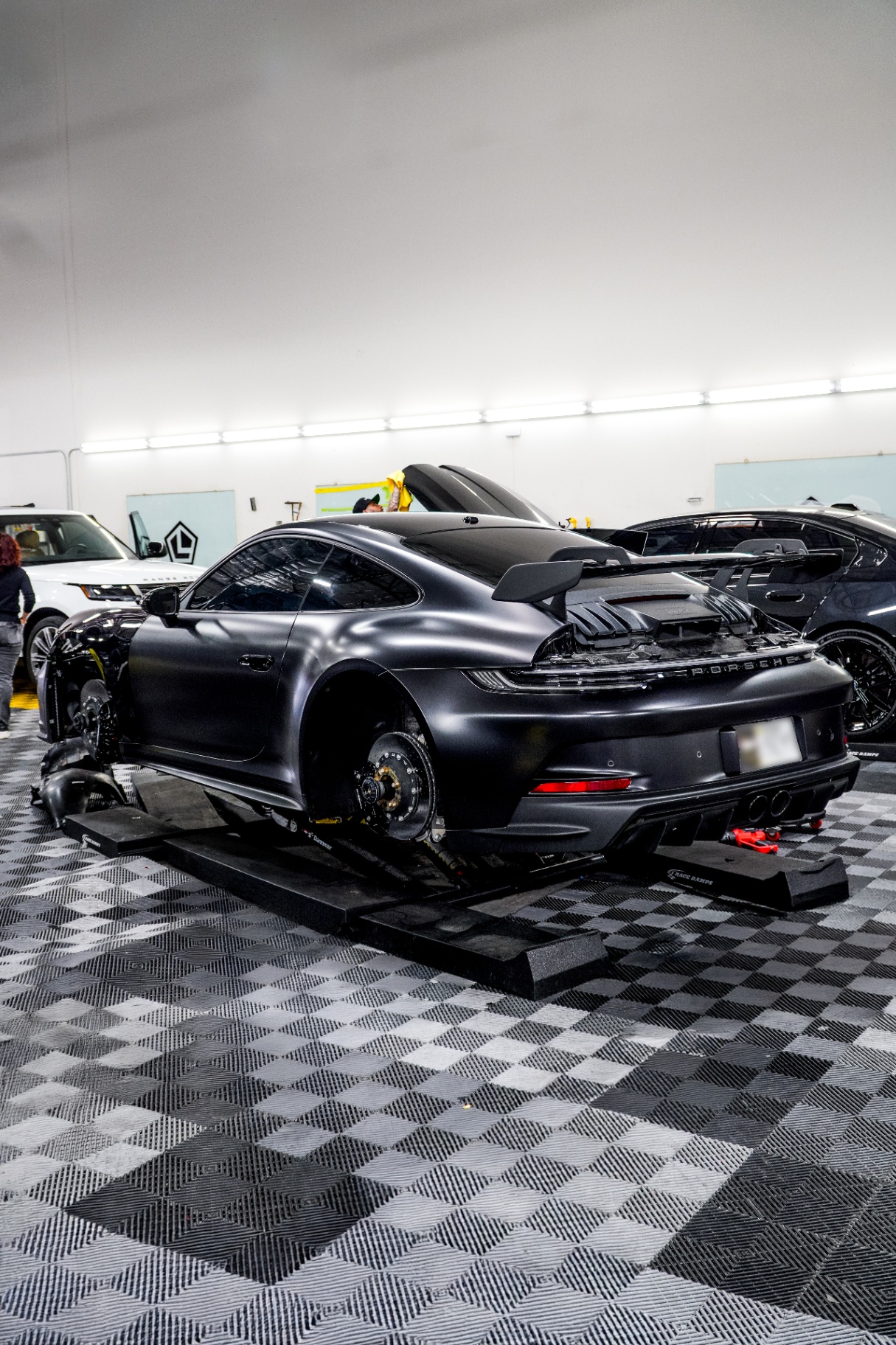 Porsche inside the Lusso PPF install bay